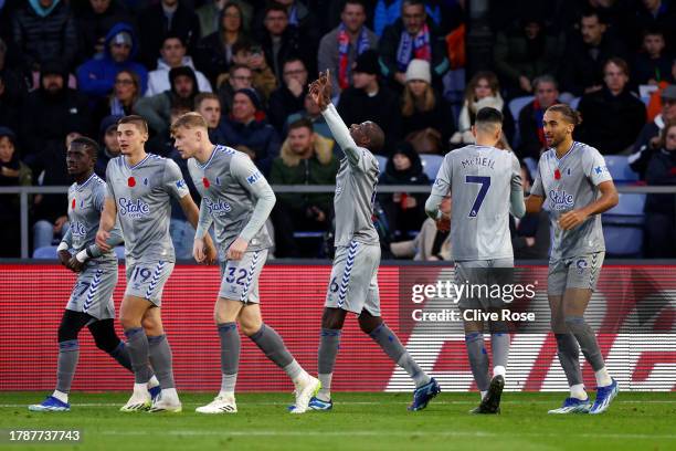 Abdoulaye Doucoure of Everton celebrates with teammates after scoring the team's second goal during the Premier League match between Crystal Palace...