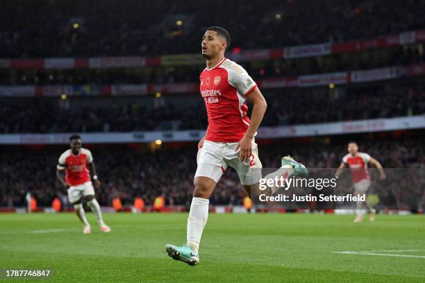 William Saliba of Arsenal celebrates after scoring the team's second goal during the Premier League match between Arsenal FC and Burnley FC at...