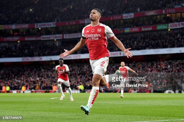 William Saliba of Arsenal celebrates after scoring the team's second goal during the Premier League match between Arsenal FC and Burnley FC at...