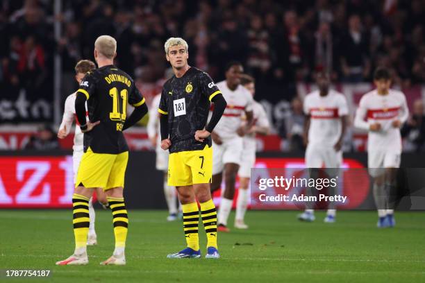 Giovanni Reyna of Borussia Dortmund looks dejected after Sehrou Guirassy of VfB Stuttgart scores his team's second goal from a penalty kick during...