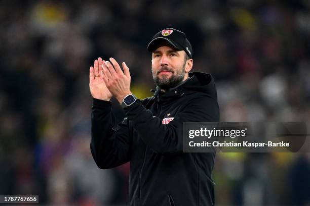 Sebastian Hoeness, Head Coach of VfB Stuttgart, applauds the fans after the team's victory in the Bundesliga match between VfB Stuttgart and Borussia...