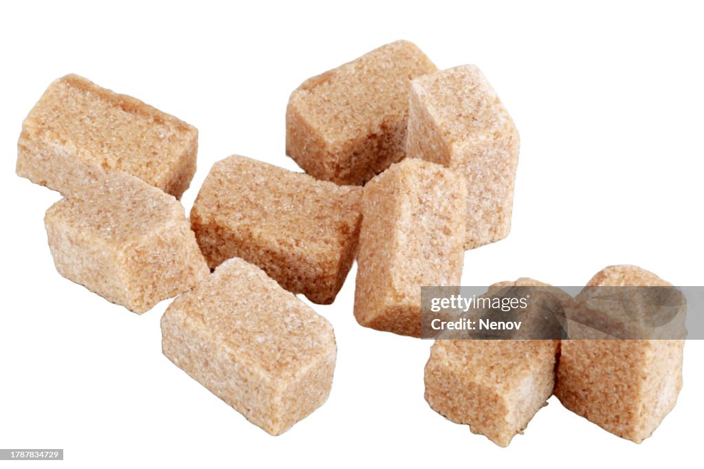 Brown sugar cubes on a white background