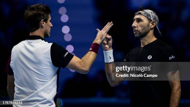 Santiago Gonzalez of Mexico and Edouard Roger-Vasselin of France celebrate during the round robin doubles match against Austin Krajicek of USA and...