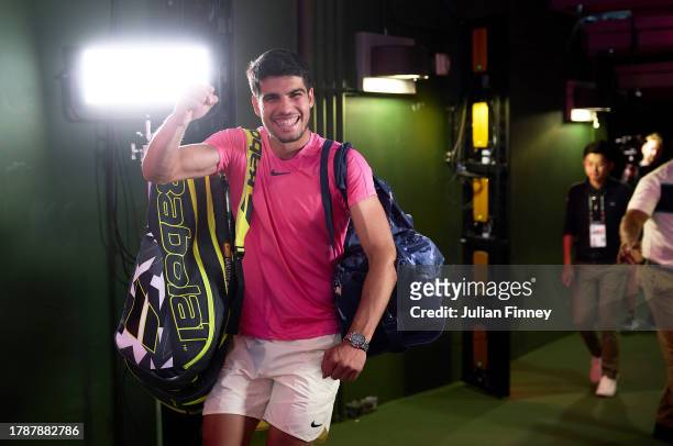 Carlos Alcaraz of Spain celebrates as he walks off court following his win over Jannik Sinner of Italy in the semi final during the BNP Paribas Open...