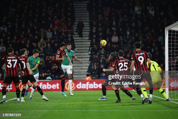 Jamaal Lascelles of Newcastle United heads the ball which is later saved by Neto of AFC Bournemouth during the Premier League match between AFC...