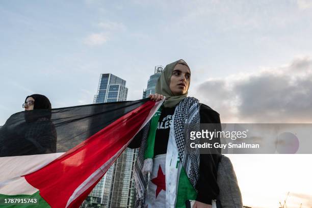 Pro-Palestine marchers on Vauxhall Bridge on November 11, 2023 in London, England. The protest's organisers, which included the Palestine Solidarity...
