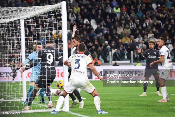 Daniele Rugani of Juventus scores to give the side a 2-0 lead during the Serie A TIM match between Juventus and Cagliari Calcio at Allianz Stadium on...