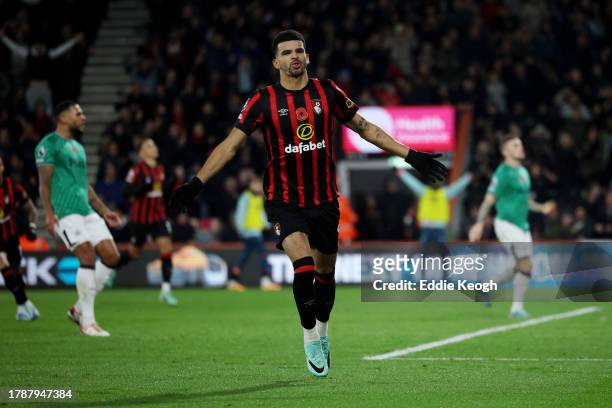 Dominic Solanke of AFC Bournemouth celebrates after scoring the team's first goal during the Premier League match between AFC Bournemouth and...