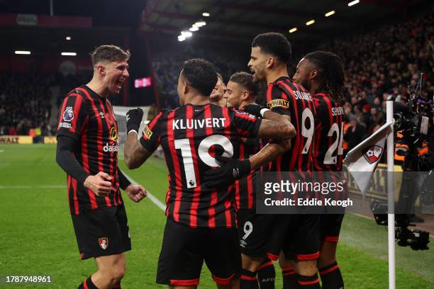 Dominic Solanke of AFC Bournemouth celebrates with teammates after scoring the team's first goal during the Premier League match between AFC...