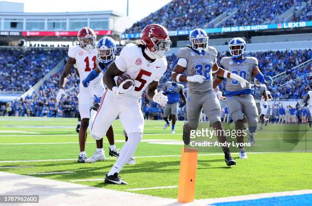 Roydell Williams of the Alabama Crimson Tide runs for a touchdown against the Kentucky Wildcats at Kroger Field on November 11, 2023 in Lexington,...