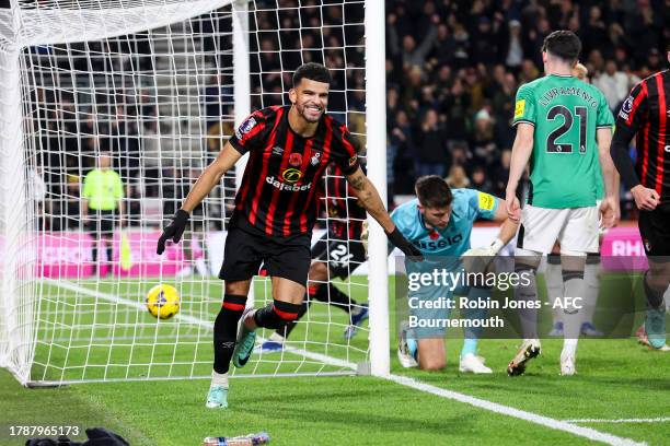 Dominic Solanke of Bournemouth scores a goal to make it 2-0 at the near post and during the Premier League match between AFC Bournemouth and...