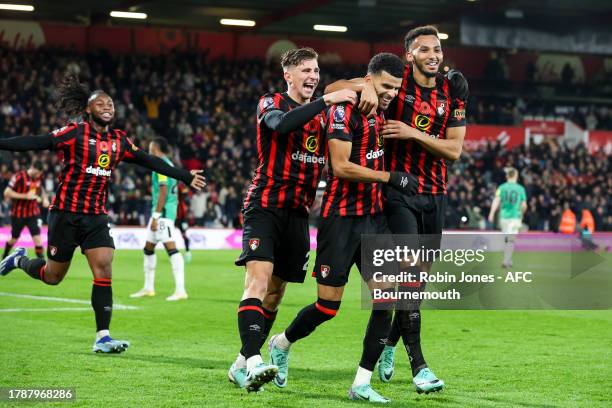 Dominic Solanke of Bournemouth scores a goal to make it 2-0 at the near post and celebrates with team-mates Antoine Semenyo, Illia Zabarnyi and Lloyd...