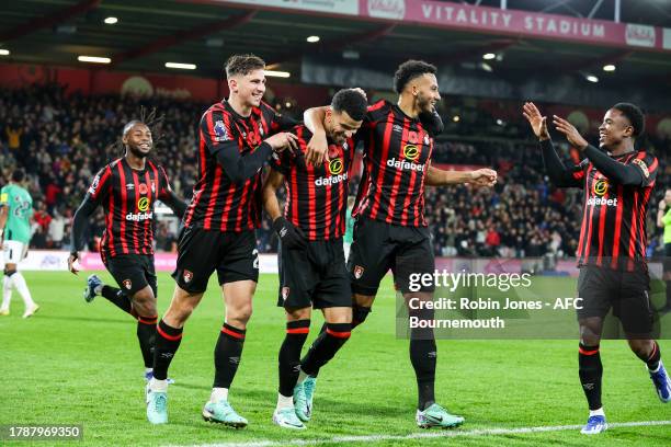 Dominic Solanke of Bournemouth scores a goal to make it 2-0 at the near post and celebrates with team-mates Antoine Semenyo, Illia Zabarnyi, Lloyd...