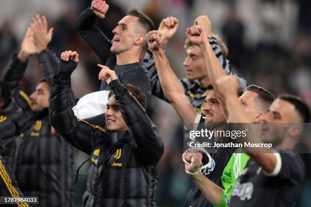 Daniele Rugani of Juventus celelbrates with team mates following the final whistle of the Serie A TIM match between Juventus and Cagliari Calcio at...