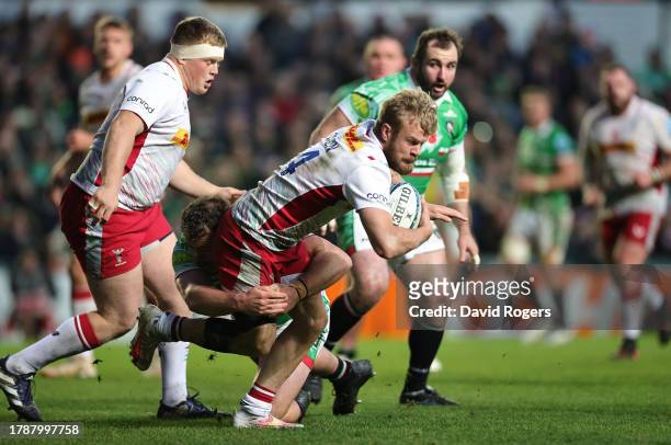 Tyrone Green of Harlequins is held during the Gallagher Premiership Rugby match between Leicester Tigers and Harlequins at Mattioli Woods Welford...