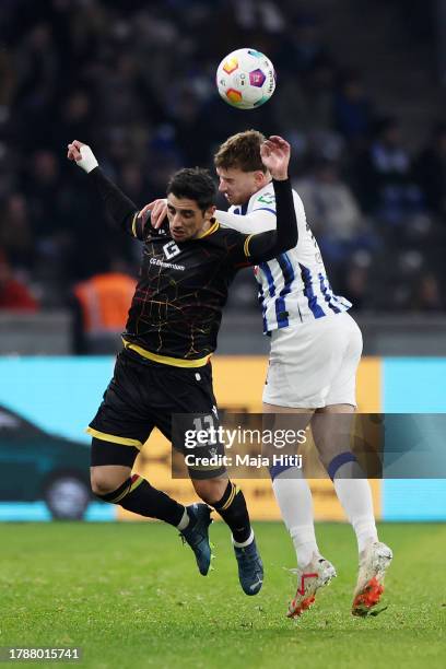 Lars Stindl of Karlsruher SC and Marten Winkler of Hertha Berlin battle for a header during the Second Bundesliga match between Hertha BSC and...