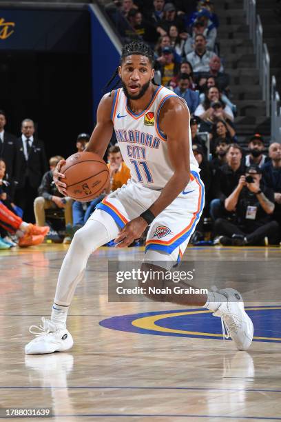 Isaiah Joe of the Oklahoma City Thunder dribbles the ball during the game against the Golden State Warriors on November 16, 2023 at Chase Center in...