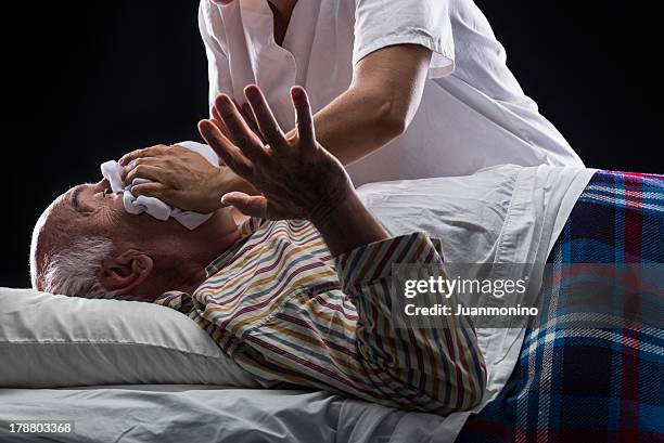 euthanasia - women being strangled stock pictures, royalty-free photos & images