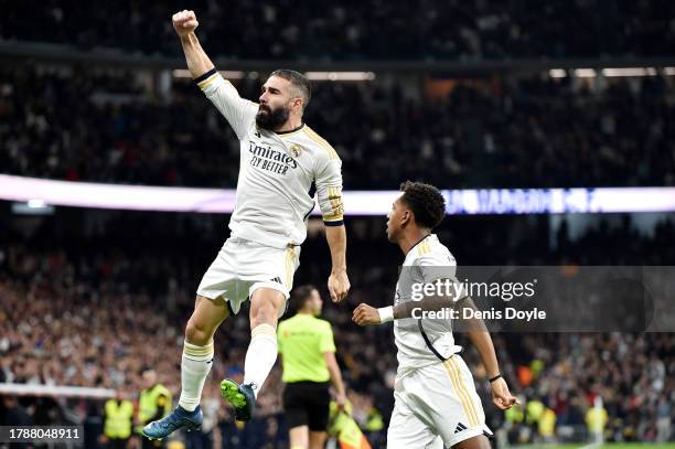 Daniel Carvajal of Real Madrid celebrates with teammate Rodrygo after scoring the team's first goal during the LaLiga EA Sports match between Real...