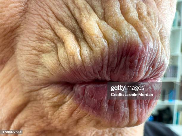 senior woman lips mouth skin - extreme close up mouth stock pictures, royalty-free photos & images