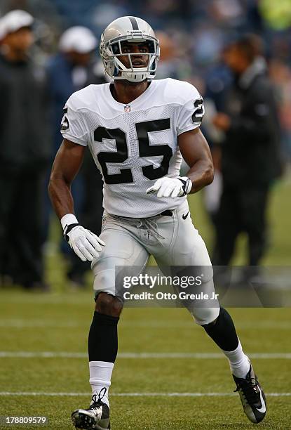 Cornerback DJ Hayden of the Oakland Raiders warms up prior to the game against the Seattle Seahawks at CenturyLink Field on August 29, 2013 in...