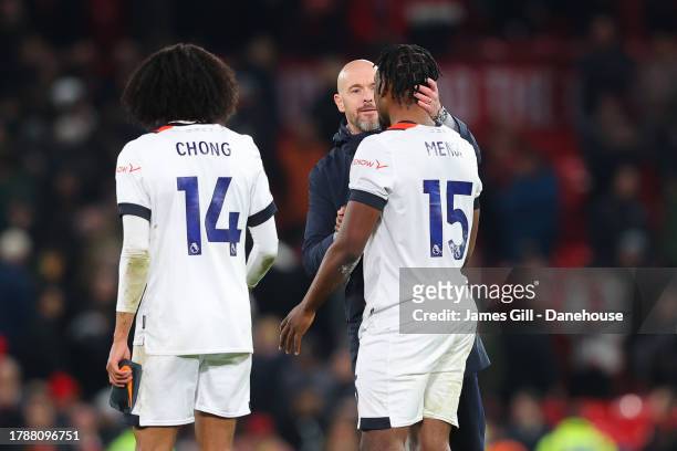 Erik ten Hag, manager of Manchester United, speaks with Teden Mengi and Tahith Chong of Luton Town during the Premier League match between Manchester...