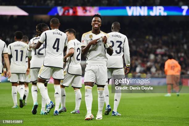 Vinicius Junior of Real Madrid celebrates after scoring the team's third goal during the LaLiga EA Sports match between Real Madrid CF and Valencia...