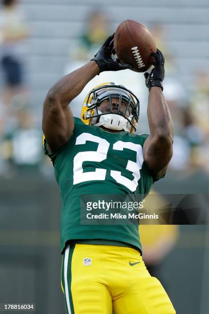 Jonathan Franklin of the Green Bay Packers runs through some pre game drill before the game against the Seattle Seahawks at Lambeau Field on August...