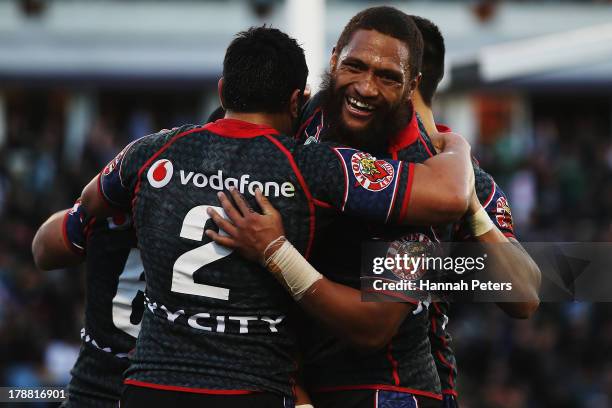 Manu Vatuvei of the Warriors celebrates after scoring a try during the round 25 NRL match between the New Zealand Warriors and the Canberra Raiders...
