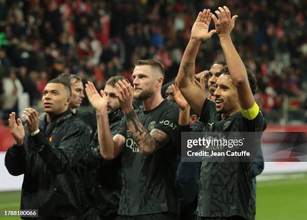Kylian Mbappe, Milan Skriniar, Marquinhos of PSG salute the supporters following the Ligue 1 Uber Eats match between Stade de Reims and Paris...