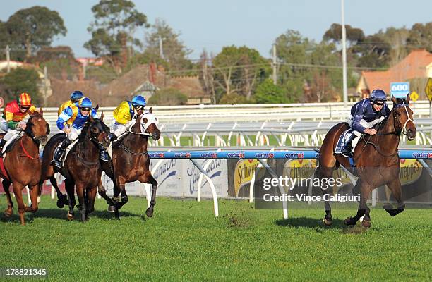 Michael Rodd riding Atlantic Jewel wins the New Zealand Bloodstock Memsie Stakes during Melbourne racing at Caulfield Racecourse on August 31, 2013...