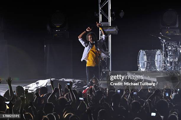 Singer Ruben Albarran of Cafe Tecvba performs live at Nokia Theatre L.A. Live on August 30, 2013 in Los Angeles, California.