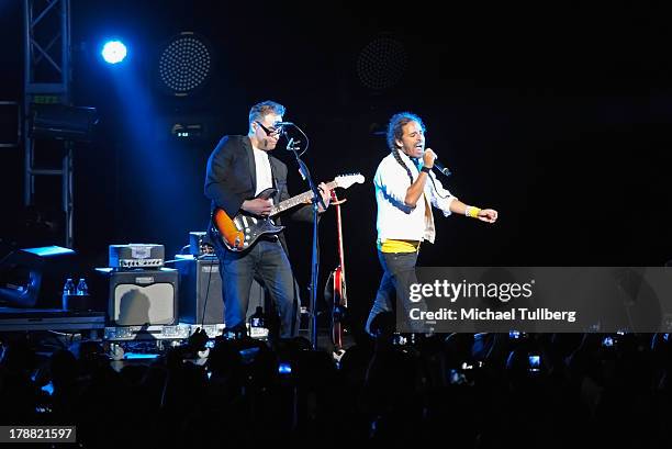 Guitarist Joselo Rangel and singer Ruben Albarran of Cafe Tecvba perform live at Nokia Theatre L.A. Live on August 30, 2013 in Los Angeles,...
