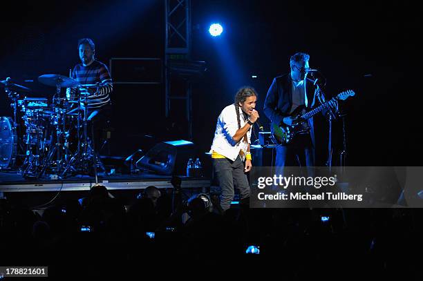 Musicians Luis Ledezma, Ruben Albarran and Joselo Rangel of Cafe Tecvba perform live at Nokia Theatre L.A. Live on August 30, 2013 in Los Angeles,...