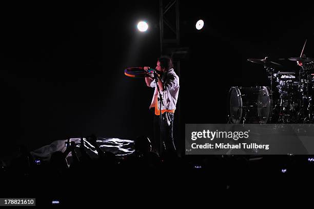 Singer Ruben Albarran of Cafe Tecvba performs live at Nokia Theatre L.A. Live on August 30, 2013 in Los Angeles, California.