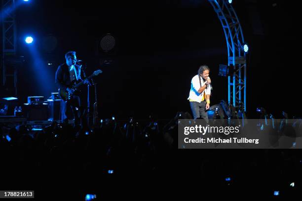 Guitarist Joselo Rangel and singer Ruben Albarran of Cafe Tecvba perform live at Nokia Theatre L.A. Live on August 30, 2013 in Los Angeles,...