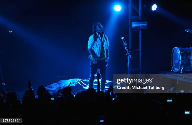 Singer Ruben Albarran of Cafe Tecvba performs live at Nokia Theatre L.A. Live on August 30, 2013 in Los Angeles, California.