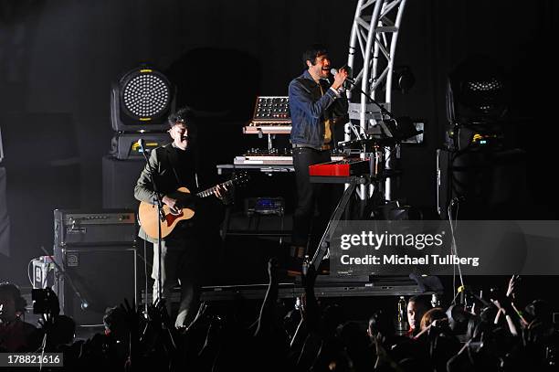 Musicians Enrique Rangel and Emmanuel del Real of Cafe Tecvba perform live at Nokia Theatre L.A. Live on August 30, 2013 in Los Angeles, California.