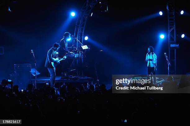 Musicians Enrique Rangel, Emmanuel del Real and Ruben Albarran of Cafe Tecvba perform live at Nokia Theatre L.A. Live on August 30, 2013 in Los...