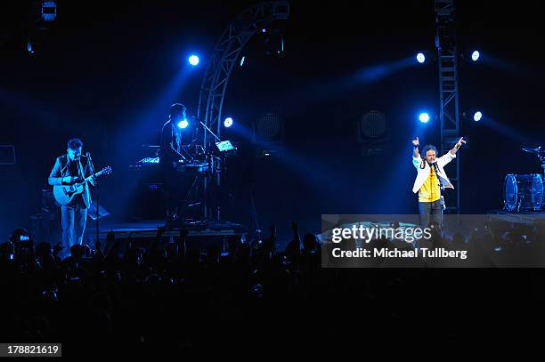 Musicians Enrique Rangel, Emmanuel del Real and Ruben Albarran of Cafe Tecvba perform live at Nokia Theatre L.A. Live on August 30, 2013 in Los...