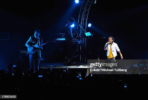Musicians Enrique Rangel, Emmanuel del Real and Ruben Albarran of Cafe Tecvba perform live at Nokia Theatre L.A. Live on August 30, 2013 in Los...