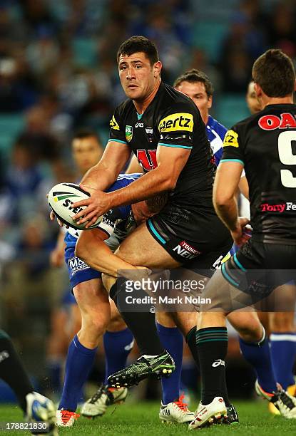 Sam McKendry of the Panthers looks for support during the round 25 NRL match between the Canterbury Bulldogs and the Penrith Panthers at ANZ Stadium...