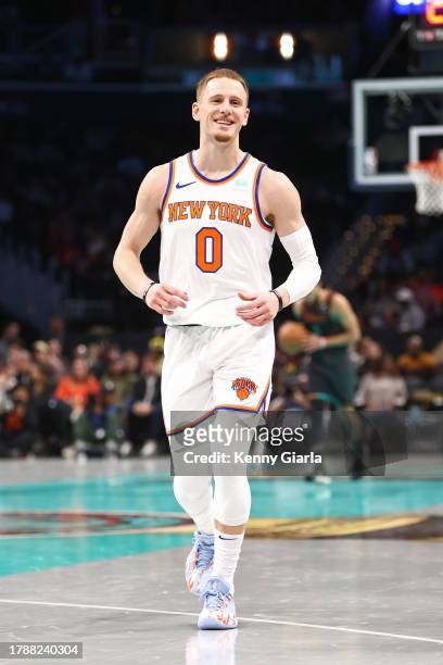 Donte Divincenzo of the New York Knicks smiles during the game against the Washington Wizards during the In-Season Tournament on November 17, 2023 at...