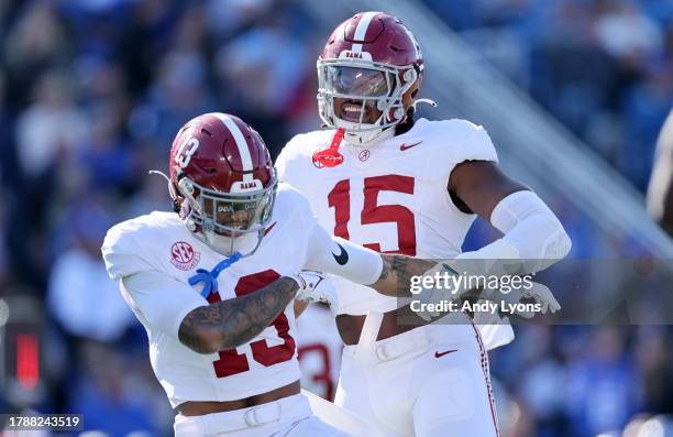 Malachi Moore and Dallas Turner of the Alabama Crimson Tide celebrate against the Kentucky Wildcats at Kroger Field on November 11, 2023 in...