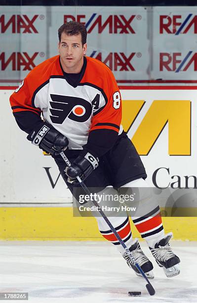 Mark Recchi of the Philadelphia Flyers skates with the puck during warm-ups prior to the NHL game against the Ottawa Senators at the Corel Center on...