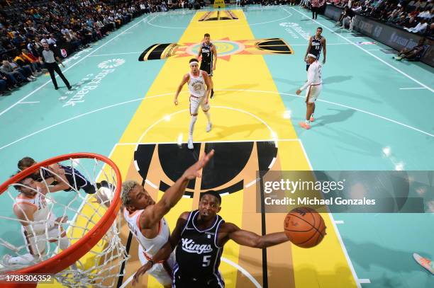 De'Aaron Fox of the Sacramento Kings drives to the basket during the game against the San Antonio Spurs during the In-Season Tournament on November...