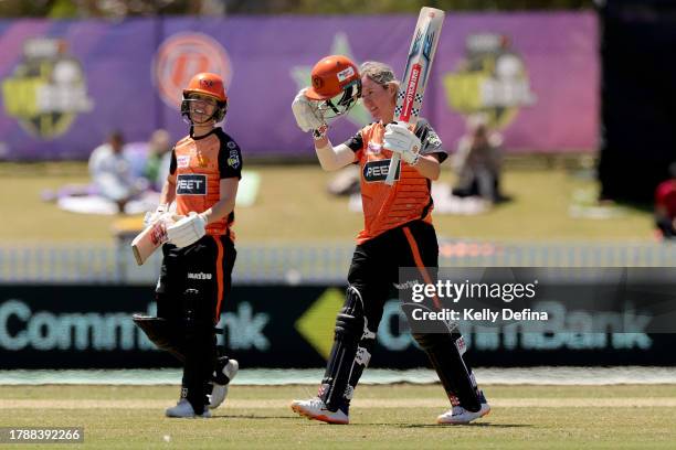 Beth Mooney of the Scorchers celebrates scoring a century during the WBBL match between Perth Scorchers and Sydney Thunder at CitiPower Centre, on...