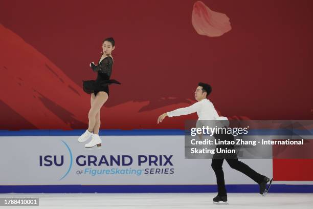 Cheng Peng and Lei Wang of China performs during the Pairs Free Skating on day two of the ISU Grand Prix of Figure Skating Cup of China at Huaxi...