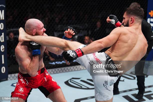 Nazim Sadykhov of Russia kicks Viacheslav Borshchev of Russia in a lightweight fight during the UFC 295 event at Madison Square Garden on November...