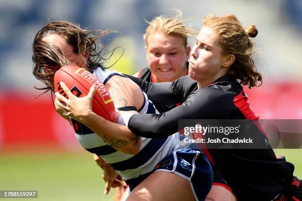 Julia Crockett-Grills of the Cats is tackled by Georgia Nanscawen of the Bombers during the AFLW Second Elimination Final match between Geelong Cats...